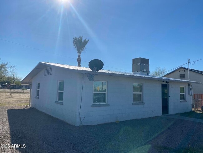 property at 203 E 12th St