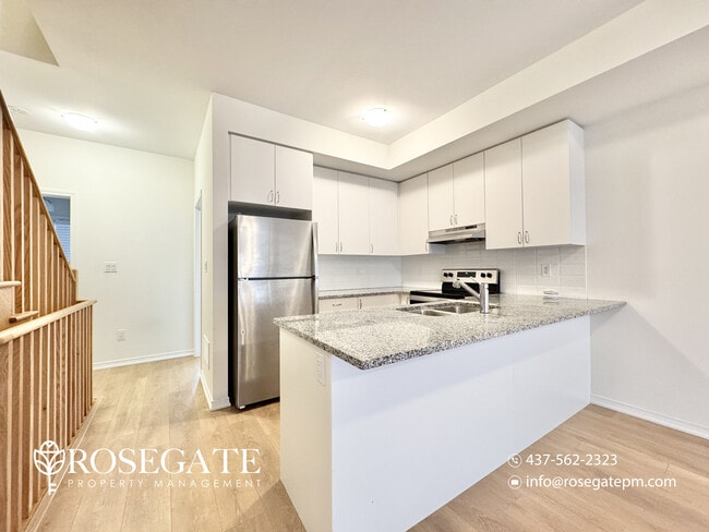 Massive 5-Bedroom + Den Townhouse with Garage & Deck in Oshawa in Oshawa, ON - Building Photo - Building Photo