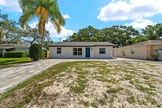 10707 N Rome Ave in Tampa, FL - Building Photo - Building Photo