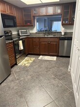 5535 Rattlesnake Hammock Rd in Naples, FL - Building Photo - Building Photo