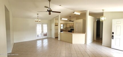 7746 Mango Grove Ave in Melbourne, FL - Building Photo - Building Photo