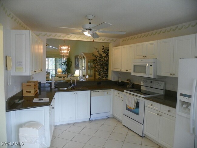 448 Gabriel Cir in Naples, FL - Building Photo - Building Photo