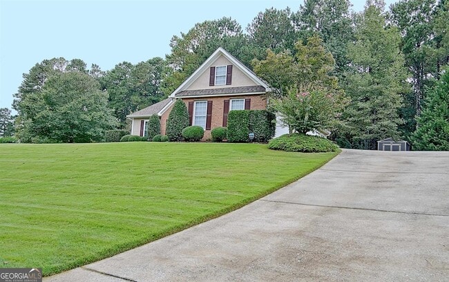 21 Wellington Mnr Dr, Unit 202 in Sharpsburg, GA - Foto de edificio - Building Photo