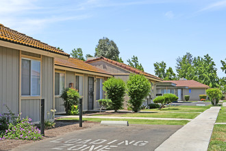 Yosemite Apartments in Merced, CA - Building Photo - Building Photo