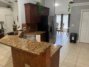 3718 SW Masilunas St in Port St. Lucie, FL - Building Photo - Building Photo