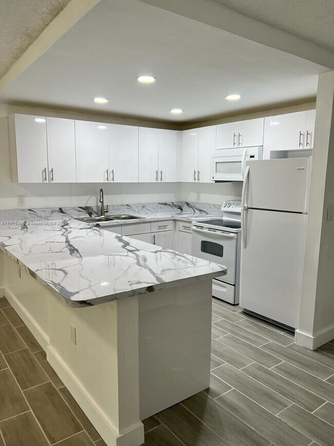 property at 6940 Miami Gardens Dr