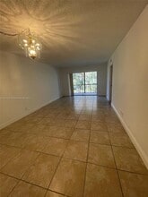 8001 Fairview Dr, Unit 206 in Tamarac, FL - Building Photo - Building Photo