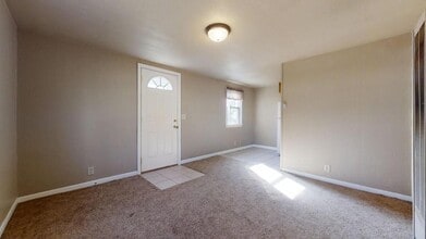 103 Eads St, Unit A in Thomasboro, IL - Building Photo - Building Photo