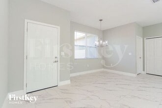 1644 Tench Ct in Poinciana, FL - Building Photo - Building Photo