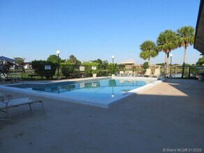 10030 NW 9th St Cir-Unit -106 in Miami, FL - Building Photo - Building Photo