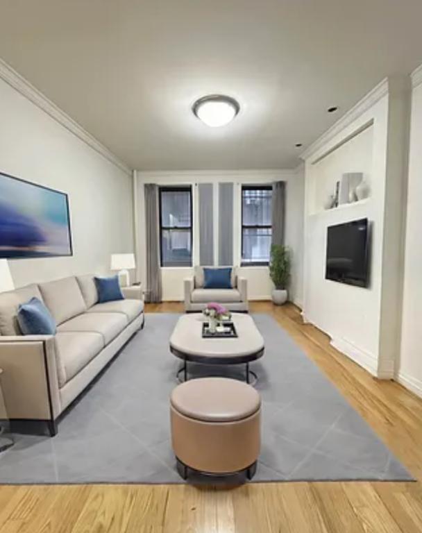 property at 208 E 34th St
