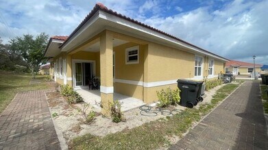 1601 Cumin Dr in Poinciana, FL - Foto de edificio - Building Photo