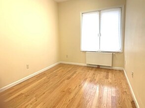 69-31 Myrtle Ave, Unit 2 in Queens, NY - Building Photo - Building Photo
