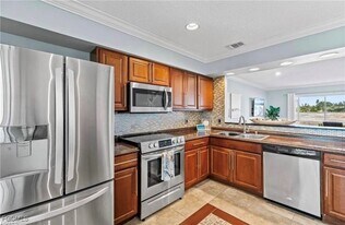 25486 Cockleshell Dr in Bonita Springs, FL - Building Photo