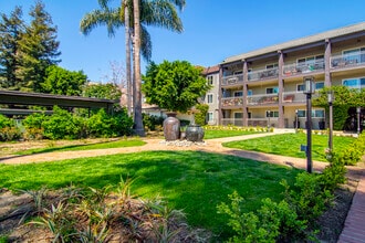 The Olive Tree Apartments in Van Nuys, CA - Building Photo - Building Photo