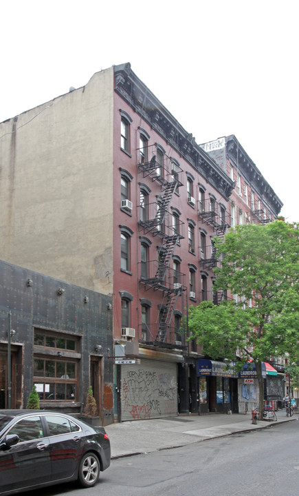 112-116 E 4th St in New York, NY - Building Photo