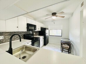 7590 Tahiti Ln in Greenacres, FL - Building Photo - Building Photo