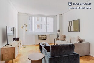 230 W 55th St in New York, NY - Building Photo