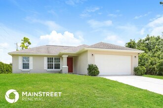 104 Zona Ave N in Lehigh Acres, FL - Building Photo - Building Photo