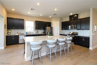 15765 Cortina St in Naples, FL - Building Photo - Building Photo