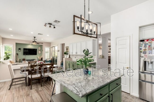 property at 3538 E Lowell Ave