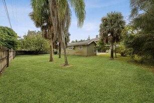 4949 Belvedere Rd, Unit Tuscany Guest House in Haverhill, FL - Building Photo