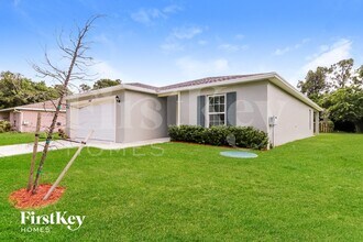 1480 SW Gadsan Ave, Unit A136 in Port St. Lucie, FL - Building Photo - Building Photo