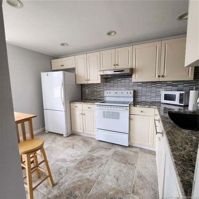 property at 1950 SW Palm City Rd