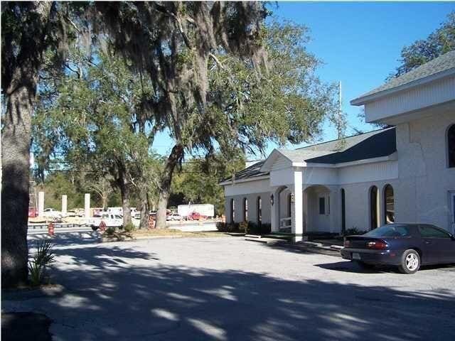property at 203 E John Sims Pkwy