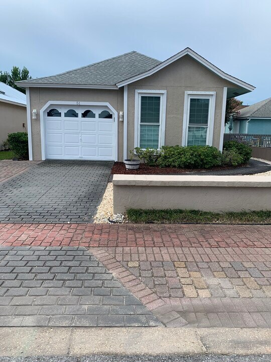 51 Rue D Honfleur in Destin, FL - Foto de edificio