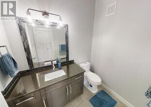 7904 Carriage Ln Dr in Grande Prairie, AB - Building Photo - Building Photo