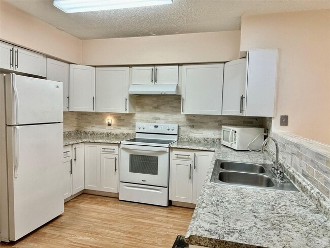 property at 11461 NW 38th St