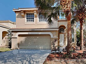 1502 Running Oak Ln, Unit 1601-A in Royal Palm Beach, FL - Building Photo