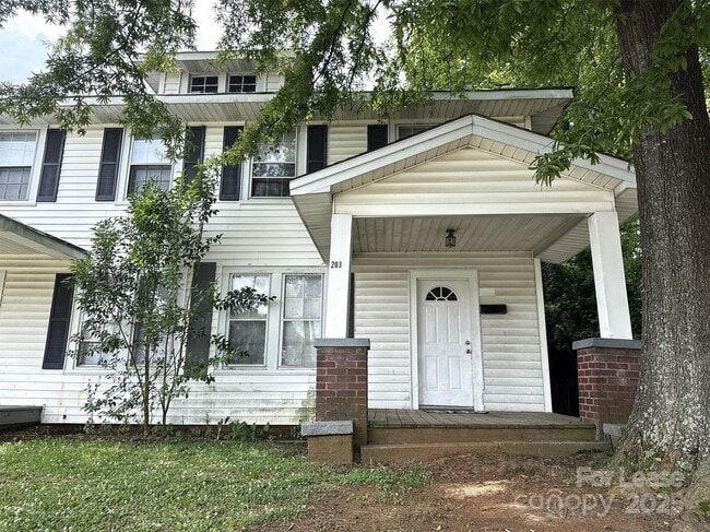 property at 203 W 3rd Ave