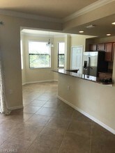 9816 Giaveno Cir-Unit -1323 in Naples, FL - Building Photo - Building Photo