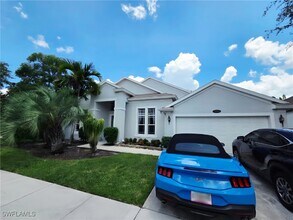 256 Burnt Pine Dr in Naples, FL - Building Photo - Building Photo