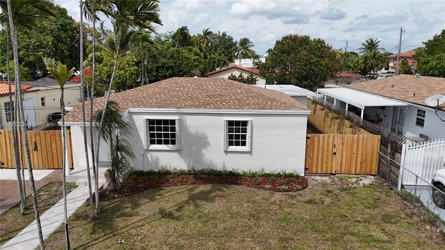 property at 6615 SW 4th St