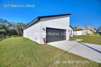 337 Hibiscus Dr in Poinciana, FL - Foto de edificio - Building Photo