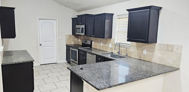 9406 Caprock Ct in Odessa, TX - Building Photo - Building Photo