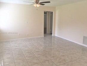 5930 Whispering Pine Way in Greenacres, FL - Building Photo - Building Photo