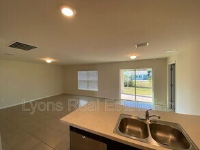 23211 McQueeney Ave in Port Charlotte, FL - Building Photo - Building Photo