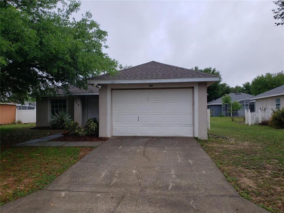144 Walpole Loop in Davenport, FL - Building Photo