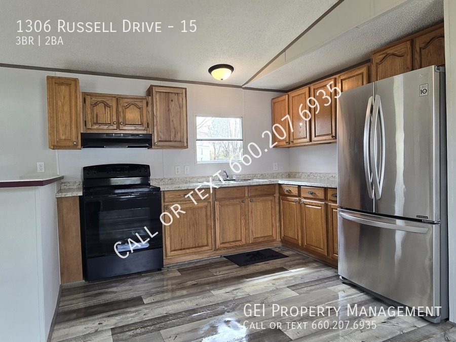 1306 Russell Dr in Weaver, AL - Building Photo