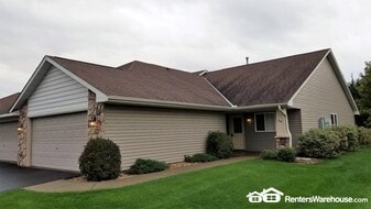 64 Crown Pointe Curve in Hudson, WI - Building Photo