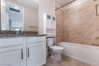 14533 Edgewater Cir in Naples, FL - Building Photo - Building Photo