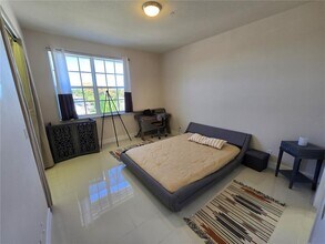 310 N Dixie Hwy, Unit 104 in Lake Worth Beach, FL - Building Photo - Building Photo