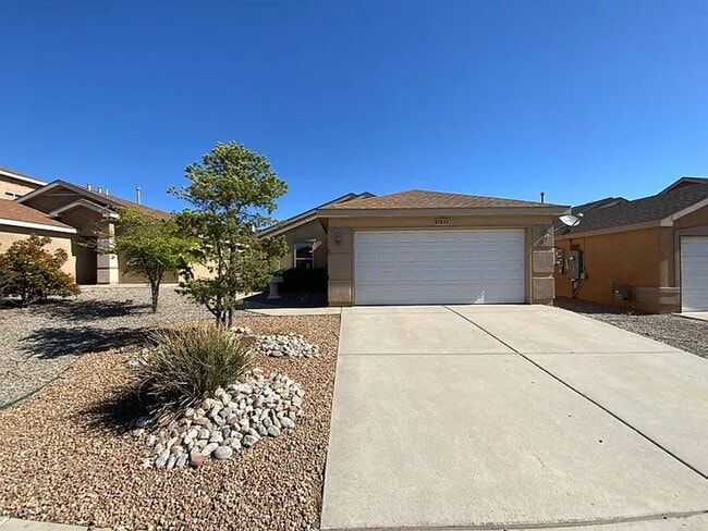 property at 7615 Prairie Falcon Ave NW