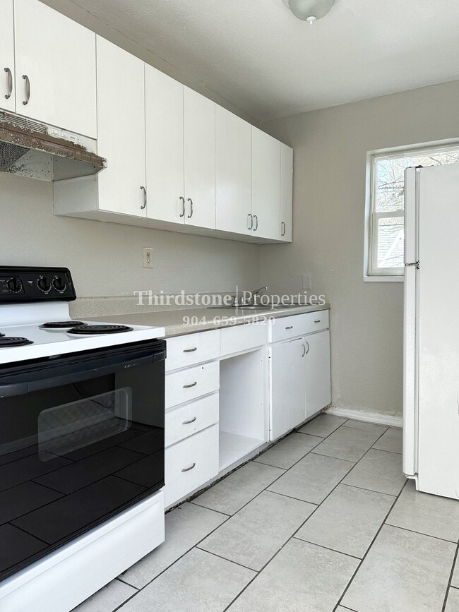 property at 1437 W 26th St