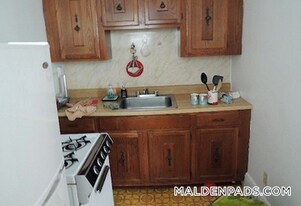 349 Pleasant St, Unit B1-24 in Malden, MA - Building Photo