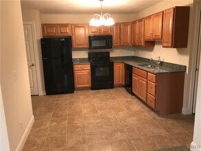 5585 St Elmos Dr in Brewerton, NY - Building Photo - Building Photo